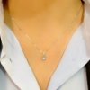 Collana con pendente in diamanti e acquamarina 