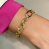 Bracciale in oro giallo e bianco 