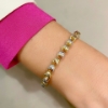 Bracciale in oro giallo e bianco a maglie sfaccettate