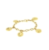 Bracciale in oro con monete pendenti