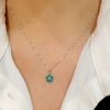 Collana con pendente in smeraldi e diamante