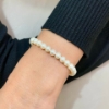 Bracciale di perle e oro