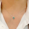 Croce con diamanti e smeraldi 