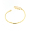 Bracciale rigido in argento con moneta