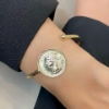 Bracciale rigido in argento con moneta