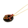 Collana in argento con pendente in onice corallo ed ambra