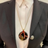 Collana in argento con pendente in onice corallo ed ambra 