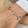 Bracciale in argento dorato e paste vitree acquamarina 