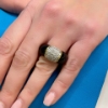 Anello a fascia bombata con diamanti ed onice 