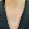 Croce con smeraldi e diamanti 