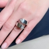 Anello contrariè in argento e zirconi 
