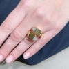 Anello contrariè in argento dorato e zirconi 