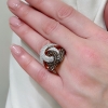 Anello in oro rosa e diamanti bianchi e brown