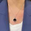Collana con campanella in onice e diamanti