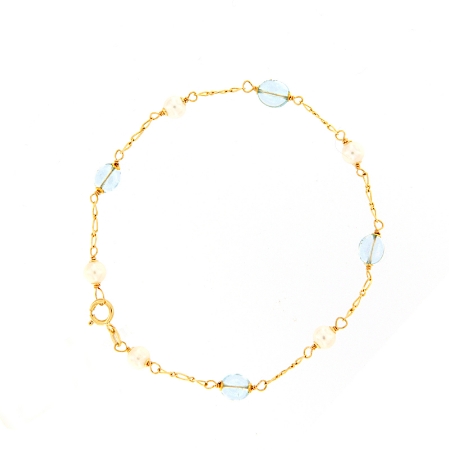 Bracciale in oro perle e topazio azzurro