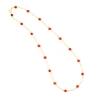 Collana in oro e sfere di corallo