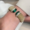 Bracciale rigido in argento e pietre