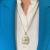 Collana con pendente in argento dorato e perle