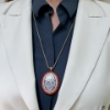 Collana con pendente in cammeo e corallo 