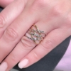 Anello in oro a due colori a fili intrecciati