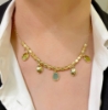 Collana corta in argento e pietre ovali sui toni del verde		
