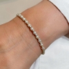 Bracciale rigido con perle e diamanti