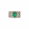 anello a fascia smeraldo e diamanti