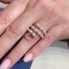 Anello a spirale in oro con perle e diamanti