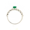Anello grumette con diamanti e smeraldo