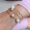Bracciali a fili in argento e perle