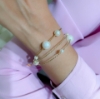 Bracciali a fili in argento e perle