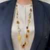 Collana lunga in argento dorato ed ambra		