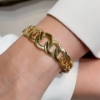 Bracciale rigido in oro maglia grumette		