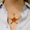 Collana con stella marina in argento e corallo