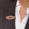 Spilla in argento stile antico con corallo