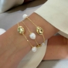 Bracciale a tre fili in argento e perle