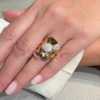 Anello a petali in argento e zirconi