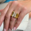 Anello in a coste in argento e zirconi