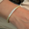 Bracciale rigido in argento satinato e zirconi