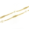 Collana lunga in argento dorato e perle