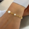 Bracciale in argento con maglia grumette e perle
