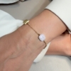 Bracciale in argento con saponette in zirconi e madreperla squadrata
