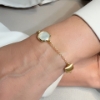 Bracciale in argento con saponette in zirconi e madreperla squadrata